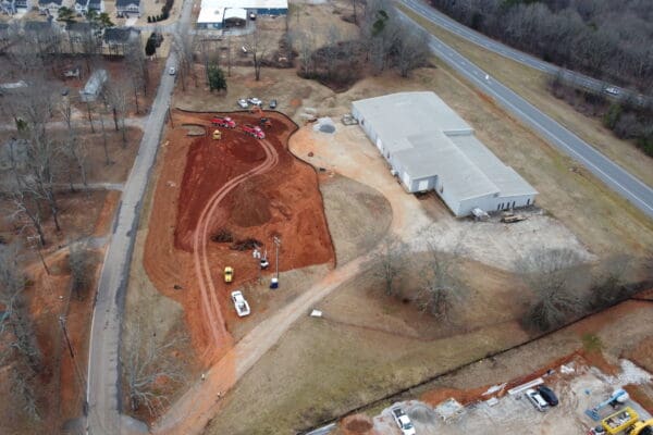 In-progress sitework at Shiloh Road commercial project in Piedmont, SC, including demolition, grading, utilities, erosion control, and paving by S3 Construction
