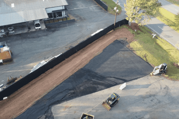 Aerial drone view of the completed Xytel Corporation industrial facility in Roebuck, SC, showcasing sitework including demolition, grading, utilities, stormwater systems, erosion control, and paving by S3 Construction