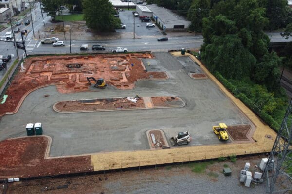In-progress sitework at Fidelity Bank in Spartanburg, SC, including grading, erosion control, utilities, and paving by S3 Construction for a new 5,528 sq. ft. facility