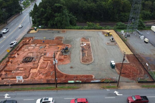 In-progress sitework at Fidelity Bank in Spartanburg, SC, including grading, erosion control, utilities, and paving by S3 Construction for a new 5,528 sq. ft. facility