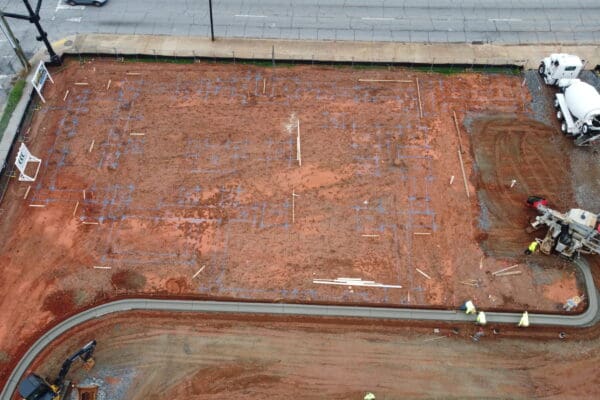 In-progress sitework at Fidelity Bank in Spartanburg, SC, including grading, erosion control, utilities, and paving by S3 Construction for a new 5,528 sq. ft. facility