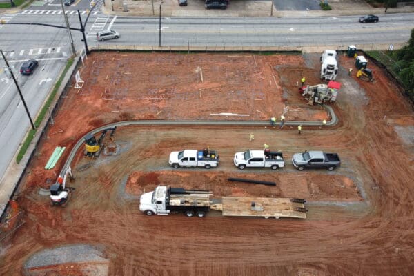 In-progress sitework at Fidelity Bank in Spartanburg, SC, including grading, erosion control, utilities, and paving by S3 Construction for a new 5,528 sq. ft. facility