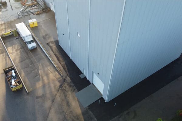 Aerial drone view of the completed Xytel Corporation industrial facility in Roebuck, SC, showcasing sitework including demolition, grading, utilities, stormwater systems, erosion control, and paving by S3 Construction