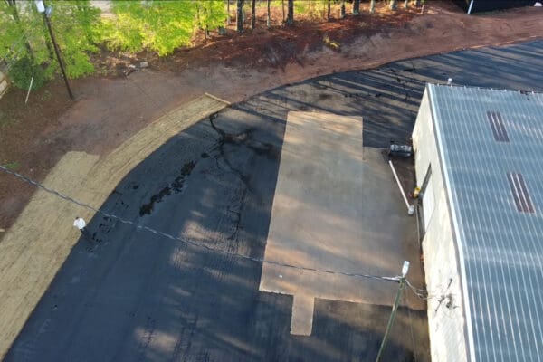 Aerial drone view of the completed Xytel Corporation industrial facility in Roebuck, SC, showcasing sitework including demolition, grading, utilities, stormwater systems, erosion control, and paving by S3 Construction